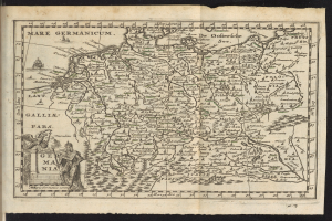 Ein Plan einer vorgeschlagenen Wohnsiedlung auf einem Blatt Papier, unterteilt in farbcodierte Abschnitte mit Etiketten und Text, der die Anzahl der Geb├Ąude, Stra├čen und andere Merkmale detailliert.