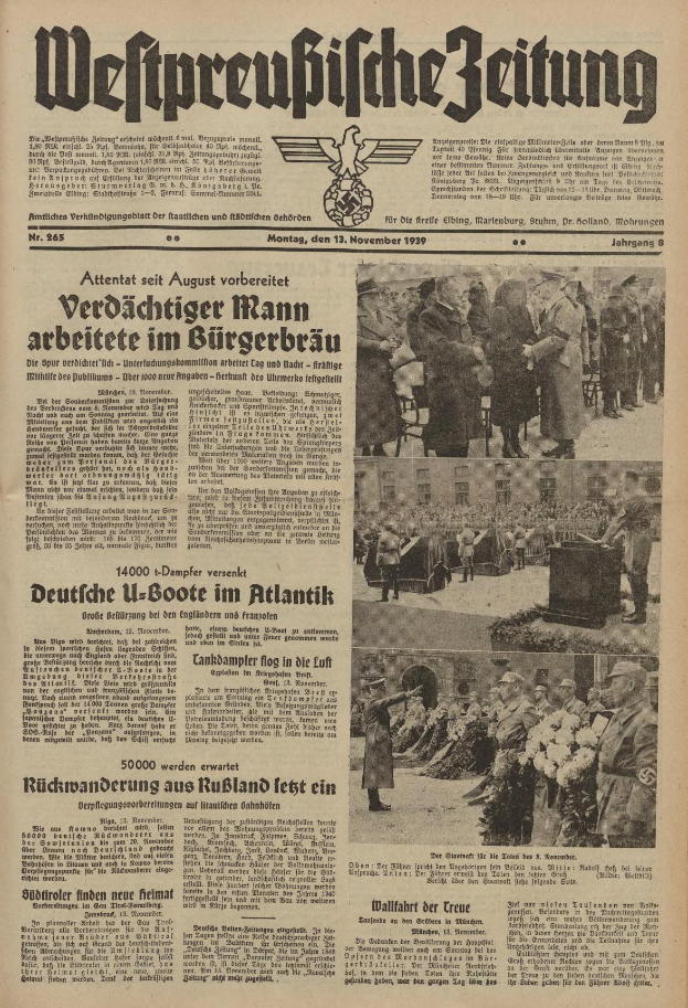 Schwarze und weiße Titelseite einer deutschen Zeitung vom 13. November 1939, betitelt "Weitpreubliche Zeitung", mit einem Gruppenbild von Menschen in traditioneller deutscher Tracht in einer feierlichen Umgebung.