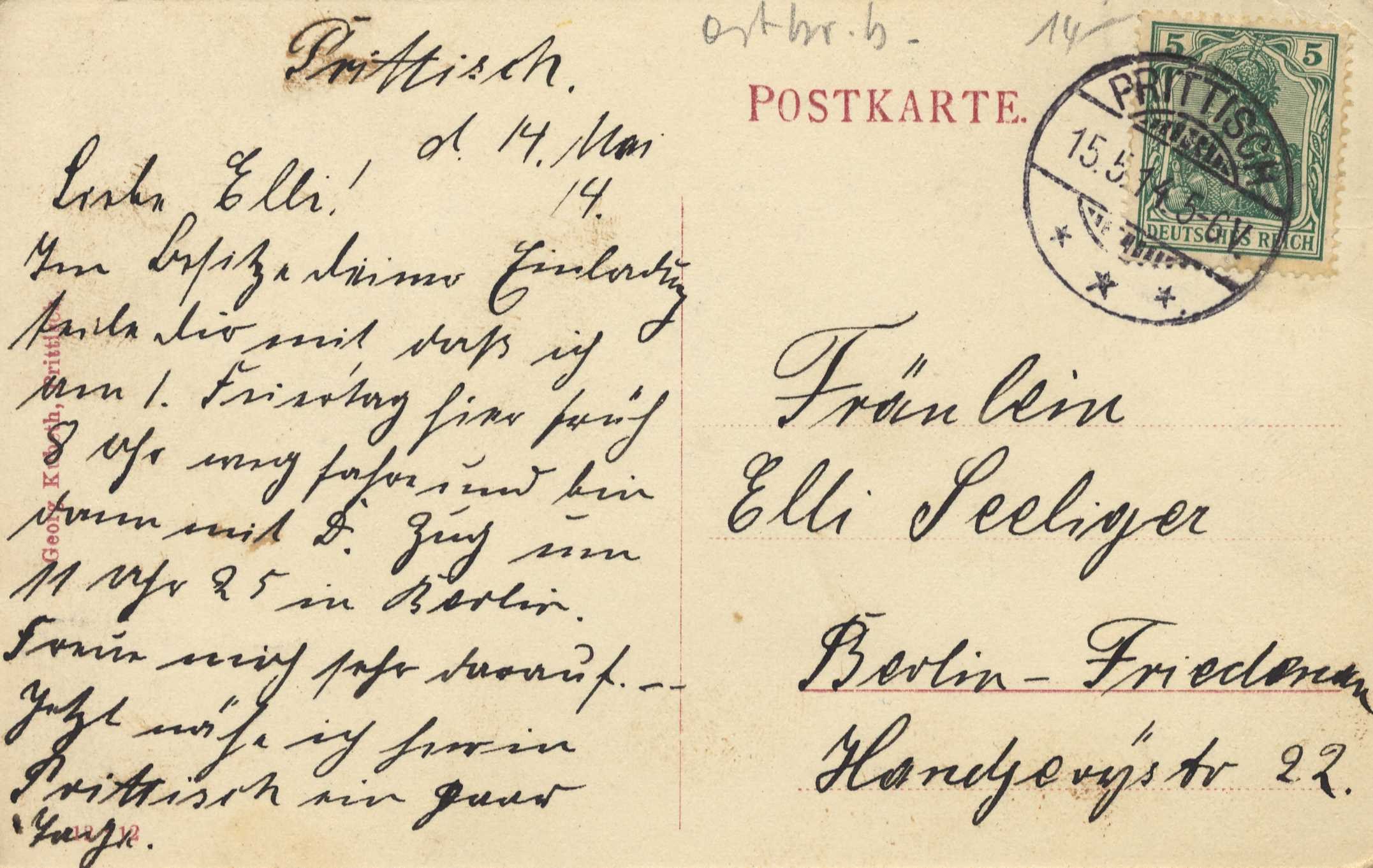 Alte deutsche Postkarte von Berlin nach Freiburg mit einer Briefmarke und handgeschriebenem Text.