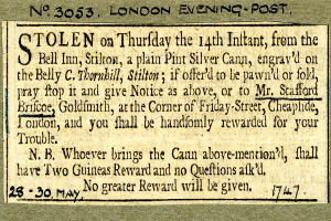 Eine Schwarz-Weiß-Postkarte mit dem Bild eines Mannes und einem Text über einen gestohlenen Gegenstand.