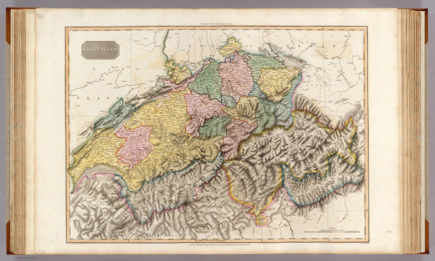 Ein altes Buch mit einer detaillierten Karte der Schweiz, einschließlich Länder und Regionen, mit begleitendem Text, der zusätzliche Informationen bietet.