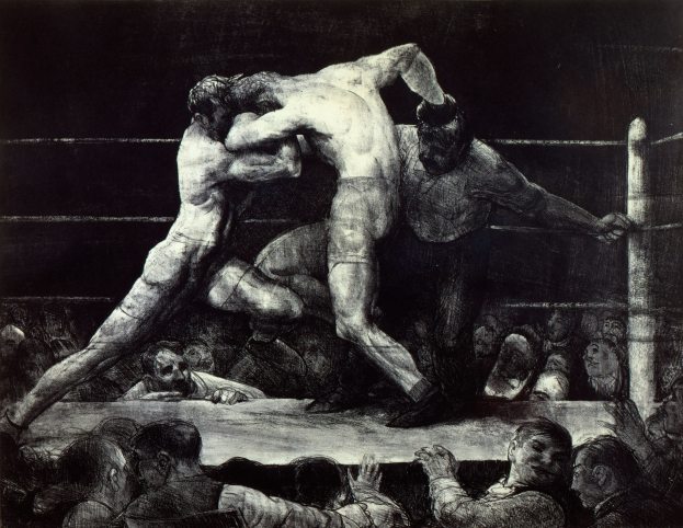 Zwei Boxer tauschen im Ring Faustschläge aus, während eine jubelnde Menge zusieht.