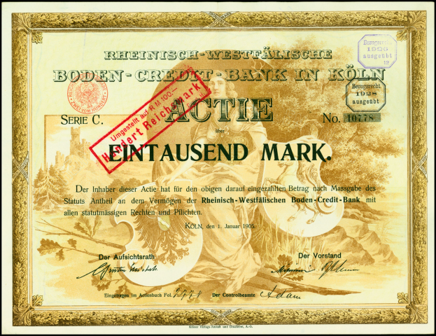 Rahmt altes deutsches Bankzertifikat mit Porträt eines Mannes im Anzug und Krawatte mit ernstem Gesichtsausdruck sowie Text und Stempel.