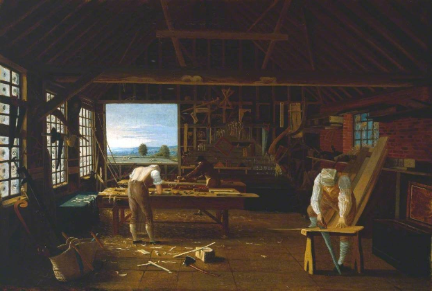 Gemälde mit dem Titel "Die Schreinerwerkstatt" von William Hogarth, das zwei Männer bei der Arbeit in einer Werkstatt mit Werkzeugen und Gegenständen auf einem zentralen Tisch zeigt, Fenster links und rechts sowie eine Hintergrundansicht von Bäumen, Bergen und Himmel.